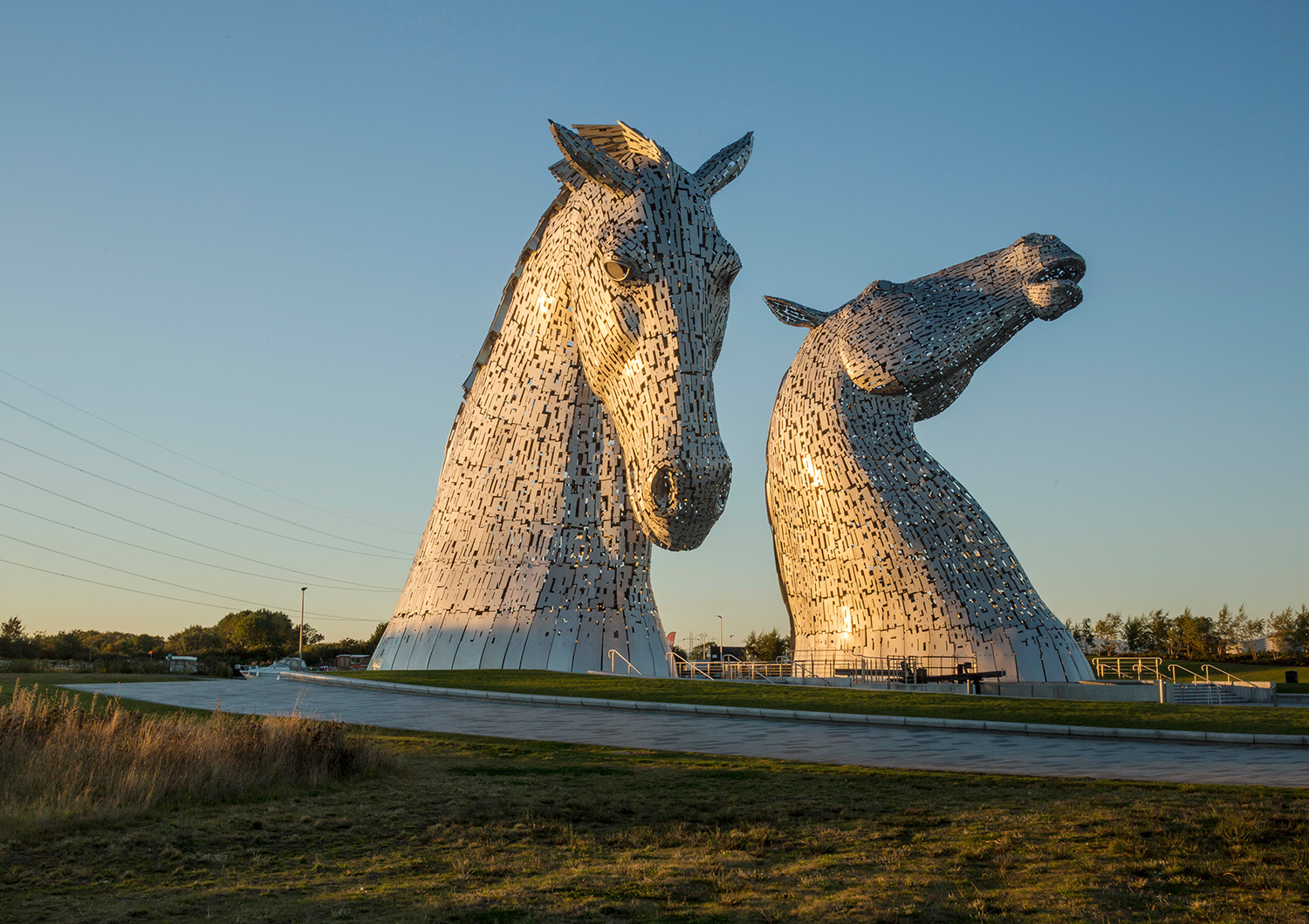 Two 30ft steel sculptures of horses heads