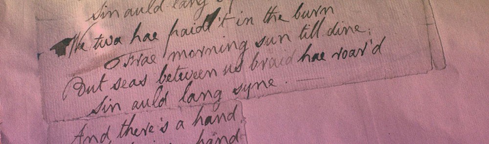 A piece of parchment with handwriting on it.