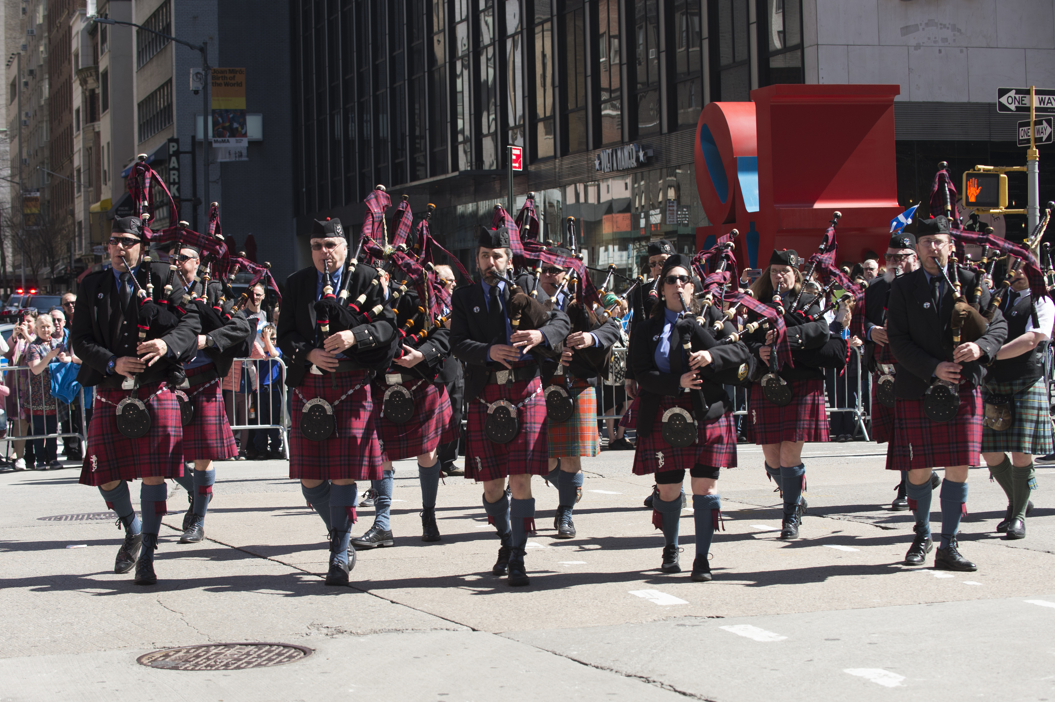 Pipe band marching in New York as part of Tartan Day Parade