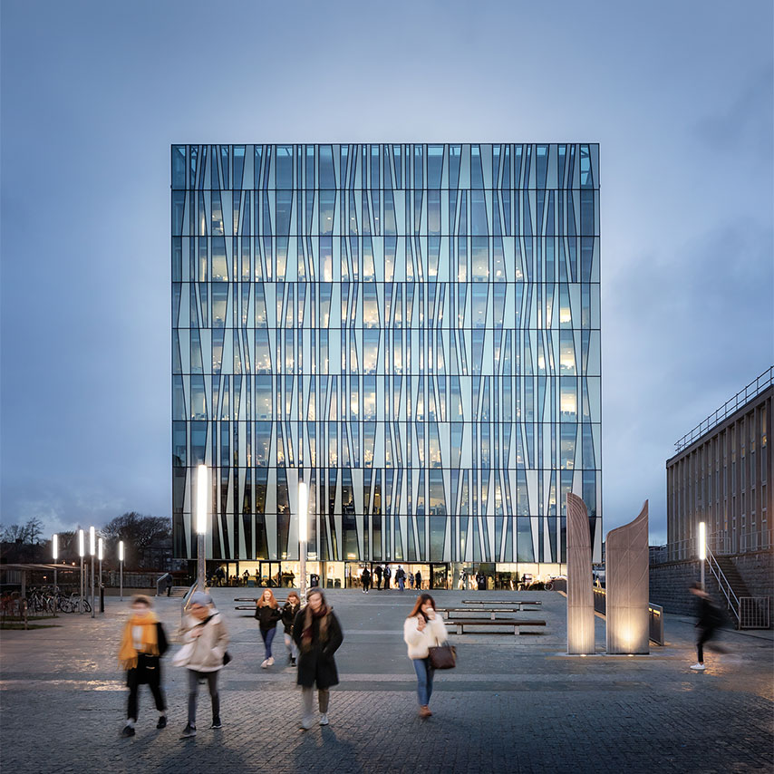 Image of students walking outside Aberdeen University's Sir Duncan Rice library building.