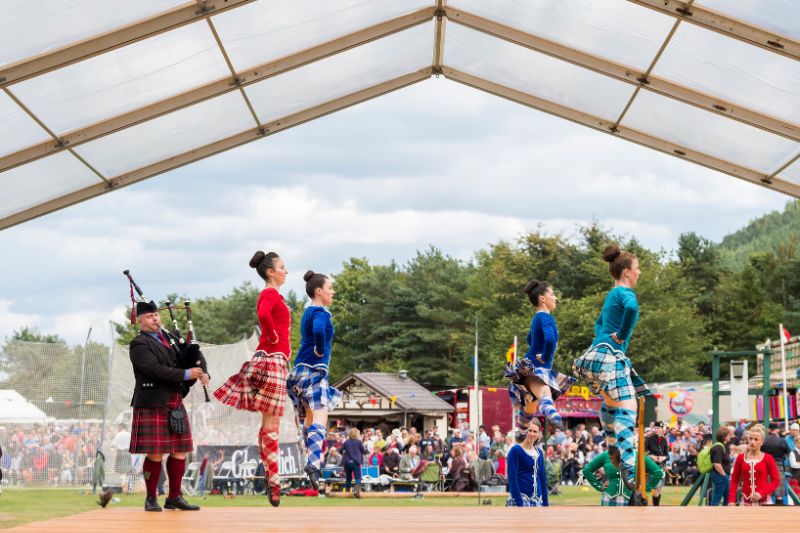 Highland dancers perform traditional Scottish dance at The Ballater Highland Games