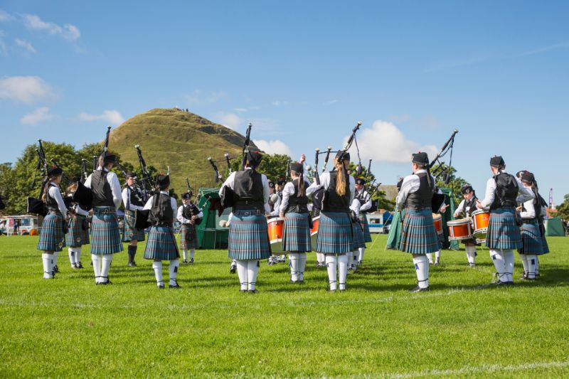 Pipe band playing pipes and drums at the North Berwick Highland Games